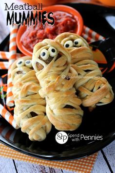 some food on a plate with googly eyes