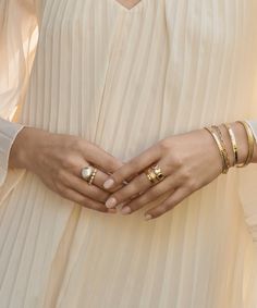 Our gold stacking ring features a modern, scalloped edge, formed by joining delicate gold discs together. Shop ethically crafted Bali jewelry at Anna Beck.