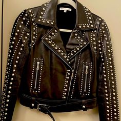 Gorgeous Leather Jacket With Studs Worn Once, In Excelente Condition No Rips No Stains .. Luxury Fall Outerwear With Rivets, Designer Leather Jacket With Rivets For Fall, Designer Winter Outerwear With Rivets, Designer Biker Jacket With Rivets For Fall, Luxury Black Biker Jacket For Spring, Trendy Black Studded Outerwear, Edgy Black Leather Jacket With Rhinestone Rivets, Fitted Studded Biker Jacket, Luxury Studded Biker Leather Jacket