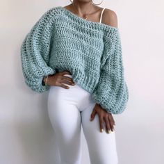 **READY TO SHIP** 📦 Chunky Super SOOOFFFFTTTT Crochet Crop Sweater  Boho Relax Fit Off the Shoulder Crop Sweater The perfect sweater to throw on after a yoga / gym session to do errands Layer over a dress for cooler weather Super cute beach cover for breezy days Size : Large to Extra Large Approximate measurements 📐 Cuff to Cuff : 60 inches Top to Bottom : 14 inches Chest : 60 inches Colors : Light Mint  🧶 Stitch by Stitch teaches patience and appreciation 100% HANDMADE by yours truly in a smoke free and pet free home studio Thank you for stopping by today! Many hugs ☺️ KeKe Please feel free to message me for more colors and sizes Custom Order ( please allow 1 week before shipping ) Care: Hand wash cold and air dry Vegan friendly. Perfect for those allergic to animal fibers Trendy Chunky Cropped Sweater, White Chunky Crop Sweater, Casual Oversized Chunky Knit Cropped Sweater, Crochet Ultra Crop Sweater, White Fitted Chunky Knit Cropped Sweater, Crochet Crop Sweater, Summer Work Dresses, Knit Cropped Sweater, Sweater Handmade