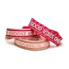 "FEATURES --Sold as a set of 3 --Embroidered front signature --Pink, Hot Pink, White and Beige cotton --Slide fastening with tassels; bracelets adjustable for wrists 6\" - 7.5\" PHRASES: Good Vibes Only Choose Joy Smile Often * Be Kind The grown-up version of friendship bracelets We are SO HERE FOR THESE. In case you've forgotten, a friendship bracelet is given as a symbol friendship. We've chosen 3 phrases to celebrate friendship and positivity that we know you'll love as much as we do. This se Woven Friendship Bracelets, Coffee Cup Photo, Embroidered Bracelet, Bracelets Adjustable, White And Beige, I Love Ny, Choose Joy, Boho Bracelet, Mom And Sister