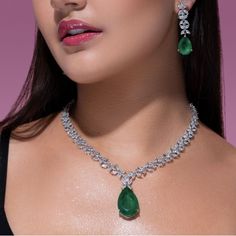 Luxury Emerald Necklace And Earring Set By Jaipur Rose Featuring A Green Emerald Pendant And Cubic Zirconia Stones Handmade In India. Bridal Diamond Jewellery Set, Green Stone Necklace Indian, Diamond Necklace Set Bridal, Emerald Necklace Indian, Gown Jewellery, Diamond Necklace Set Indian, Emerald Jewelry Necklace, Gold Indian Jewelry, Green Necklace Set