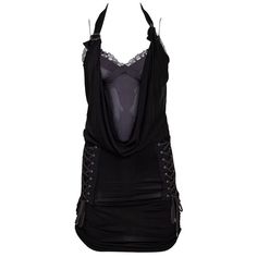 Discover The Edgy Elegance Of The Christian Dior Lace-Up Cowl Black Bodycon Halter Dress, Size Fr 36. Designed By John Galliano In 2004, This Striking Piece Features Signature Dior Star Buckle Accents, A Unique Cowl Neckline, And A Silk Slip Beneath. The Dress Showcases The Dior Logo On The Side, With Cinching Details, Spaghetti Straps, And A Halter Neckline. Recommended For U.S. Sizes Xs/S, It Measures Bust 26.75", Waist 26", Hip 23", And Length 34.75". The Dress Shows Some Wear, Including Loos Bodycon Halter Dress, Edgy Elegance, Dior Star, Dior Logo, Cowl Neckline, Silk Slip, Black Bodycon Dress, John Galliano, Halter Neckline