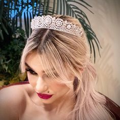 Delicate bridal crown for a soft and elegant wedding day look. Encrusted with Swarovski crystals and cubic zirconium for endless glitter. -Genuine Crystal -AAA Cubic Zirconia -Comb added for comfort and security -Approx. 1.5 in (3.8 cm) wide x 10 in. (25.4 cm) long -Rhodium Plated. Brilliant non tarnish silver finish Wedding Headpiece Crown Headband, Wedding Headpiece With Tall Crown Design, Elegant Headpiece With Tall Crown Design, Wedding Headband With Crown Design, Elegant Wedding Crown Headpiece, Princess Style Wedding Crown With Structured Design, Elegant Wedding Crown With Teardrop Shape, Elegant Wedding Crown With Structured Shape, Elegant Wedding Crown Headband