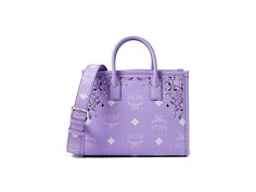 MCM Munchen Visetos Tote Small - Handbags : Bandana Purple Rose : The MCM Munchen Visetos Tote Small is the ideal accessory to store all your essentials while exuding an exquisite vibe. The tote bag comes with two shoulder straps and one wide adjsutable crossbody strap for ease of use. It features a zippered closure, one spacious internal compartment, and intricate design and details on the exteriors. Polyurethane, polyester, and cotton construction. Nylon and polyurethane lining. Imported. The Tote Bag, Purple Rose, Small Handbags, Purple Roses, Intricate Design, Designer Bags, Crossbody Strap, Leather Tote, Shoulder Straps