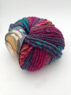 a ball of yarn sitting on top of a white table