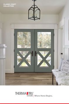 therma tru double doors are shown in an open room with white walls and wood floors