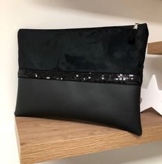 "Black glitter MacBook sleeve, zipped cover for 11 to 15,6 inches computer, made to measure in a few days, for the transport and protection of your electronic device on a daily basis. This zipped case is made of a beautiful black suede, with a velvety feel, suede effect and a black \"Weston\" grained imitation leather, redecorated all around with black sequins. This case closes with a coordinated zip, itself adorned with a large black suede tassel. The inside of this cover is entirely lined with a printed fabric in perfect harmony with the shades of the case. The protective aspect of this case is designed by a fleece lined with felt. DIMENSIONS: they will be adapted to your computer: THANK YOU TO ADD IN COMMENT OF YOUR ORDER THE EXACT MODEL OF YOUR DEVICE, so that I know its 3 dimensions f Macbook Pouch, Fancy Clutch Purse, Ipad Pouch, Computer Sleeve, Diy Bags Purses, Macbook Sleeve, Suede Tassel, Macbook Case