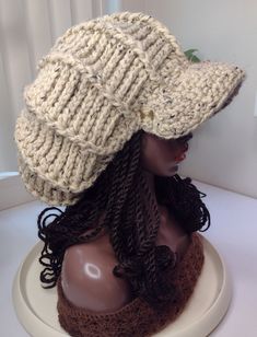 This is a handmade, crocheted, professionally finished Large XL Tam Mushroom Hat ► ITEM DESCRIPTION ITEM NAME: Oat Off-White cream Wool XL Newsboy hat ( Video shows the tam without a brim, that version is called Burgundy XL Bloom and will be on another listing )  ♦ Brim is structured to hold it's shape ♦ Has a soft, satin smooth inner band where the drawstring sits to protect your hair edges ♦ Made of a premium wool / acrylic blend yarn ♦ Inner drawstring on the inside so it has a custom, snug, stretch-proof fit.  ♦ This hat has stretch to allow fitting for larger heads ( also good if you have braids, dreadlocks, and thicker hair)  ► MATERIALS Made of a premium wool / acrylic blend yarn ► CARE INSTRUCTIONS ♦ Hand wash and Air dry ► CUSTOM OPTIONS ♦ If you would like custom options not show Crazy Hat Day, 1970's Fashion, Dreadlock Style, Newsboy Hat, Funky Hairstyles, Big Party, News Boy Hat, White Hat, Newsboy Cap