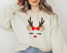 Christmas Sweatshirt, Reindeer Christmas Sweatshirt, Reindeer Face Sweatshirt, Reindeer Shirt for Woman, Christmas Shirt for Mama  ORDER INSTRUCTIONS  ➤ Check and review all listing photos. ➤ Pick up your item's size and color from drop down menus. ➤ Choose the quantity. ➤ Click "Add to Cart" button. ➤ Fill in the personalization box as recommended if provided.  ➤ You can go back to add more item or you can complete the checkout process. ➤ Click "Proceed to Check Out".  WHICH SIZE FITS ME BEST Reindeer Outfit Women, Reindeer Tshirts, Reindeer Shirt Ideas, Spirit Week School, Christmas Sweatshirt Ideas, Reindeer Shirt, Sweatshirt Ideas, Reindeer Face, Christmas Craft Fair