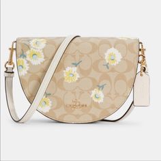 Ellen Crossbody In Signature Canvas With Daisy Print Product Details Signature Coated Canvas And Smooth Leather Inside Multifunction Pocket Magnetic Snap Closure, Fabric Lining Outside Open Pocket Detachable Strap With 22" Drop For Shoulder Or Crossbody Wear 8 1/4" (L) X 6" (H) X 2 1/4" (W) Style No. C3597 Posh Ambassador Chic Summer Coach Bags, Coach Sling Bag, Brown Leather Crossbody Bag, Coach Crossbody Purse, Grey Bag, Black Leather Satchel, Black Leather Crossbody Bag, City Bag, Signature Canvas