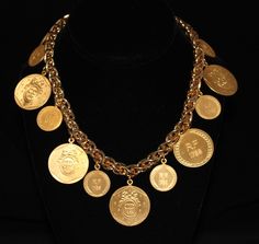 "Christian Dior Gold Plated Necklace with  Bicentenary Medals - 198 grams  Beautiful Christian Dior signed gold-plated necklace, Item F2105-024, with seven 1 3/16\" in diameter coins and six 3/4\" coins on chain. La Monnaie de Paris has minted theses limited edition commemorative medals exclusively for Christian Dior Bijoux, are all 24 kt. gold electroplated, have CD 1989 stamped on one side and RF 1789 on other. They were produced to celebrate the 200 year of the French Revolution.  Necklace is 15\" long and has an extra 1\" extension clasp making it 16\" long. It weighs 198 grams. Clasp is signed Chr. Dior, your assurance of excellence. Necklace is in mint new condition and comes complete with Christian Dior tag in a plain black velvet pouch.  PLEASE NOTE: All my Christian Dior jewelry h Dior Gold, Dior Necklace, The French Revolution, Crystal Stemware, Dior Logo, Dior Jewelry, French Revolution, Amethyst Purple, Gold Plated Rings