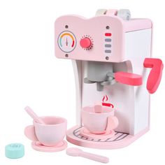 a pink toy coffee maker with cups and spoons