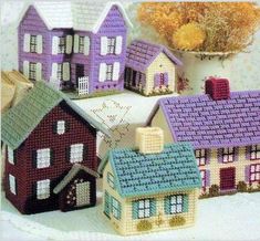 some small houses are sitting on a table