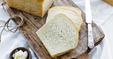 slices of bread and butter on a cutting board