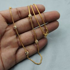 Metal - Yellow Gold Purity- 22 Karat Yellow Gold Weight- 10.37 grams approx Length- 19.5 inches long Width - 5 mm Click For More https://www.etsy.com/in-en/shop/morvijewels?ref=seller-platform-mcnav New Model Chains Gold, Plain Chains Gold, Gold Chain With Beads, Plain Chain Designs Gold, 5 Grams Gold Chain Design, Simple Gold Chains For Women, Chain Models Gold For Women, Simple Chains Gold, 10 Grams Gold Chain Design