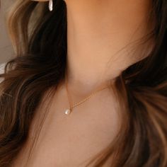 Featuring a delicate pearl and classic gold chain, this timeless piece adds a bit of romantic charm to your look. It's the perfect necklace to make your day just a little more special! DETAILS14k gold fill or sterling silver14", 16", or 18" lengths with a 1" clasp extender chain, Gemstone measures at 0.25"Hypoallergenic and waterproof Dainty Pearl Necklace With Pearl Charm For Everyday, Classic Gold Charm Necklace With Pearl Drop, Classic 14k Gold Filled Necklaces With Pearl Charm, Classic 14k Gold-filled Necklaces With Pearl Charm, Delicate Pearl Charm Chain Necklace Gift, Everyday Delicate Chain Necklace With Pearl Pendant, Everyday Delicate Pearl Pendant Chain Necklace, Dainty Pearl Charm Necklace For Everyday, Dainty Pearl Charm Chain Necklace As Gift