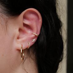 Our classic Diamond Ear Cuff is a true charmer. Designed with a hinge closure for comfort and support, you don't need a piercing to join this party. Fits snuggly around most conches. 14K Solid Gold and Kimberley Certified (Conflict-Free) DiamondsFollow us on Instagram and Facebook Classic Pierced Huggie Ear Cuff, Elegant Everyday Ear Cuff, Classic White Gold Huggie Ear Cuff, Classic Huggie Cartilage Earrings For Wedding, Classic Huggie Ear Cuff As A Gift, Classic Huggie Ear Cuff Gift, Rose Gold Huggie Ear Cuff For Everyday, Everyday Rose Gold Huggie Ear Cuff, Elegant Tiny Hoop Piercings