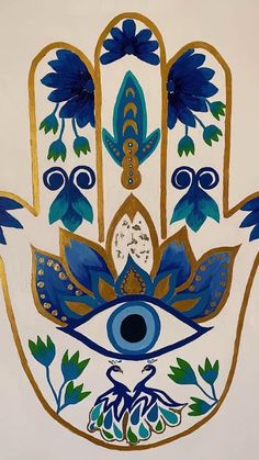 a painting of a hamsa with blue and gold designs on it's palm