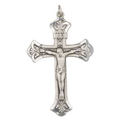 This high-quality Britannia pewter crucifix has handmade diamond-cut features for exceptional crisp detail, making it perfect for use in Rosaries and other religious-inspired jewelry. Sizes, shapes and colors may vary with handcrafted items. Silver Cross Rosary As Gift, Silver Cross Pendant With Miraculous Medal, Silver Miraculous Medal Cross Pendant Jewelry, Silver Cross Jewelry With Miraculous Medal, Silver Spiritual Crucifix Jewelry And Charms, Spiritual Silver Crucifix Jewelry And Charms, Antique Silver Engraved Crucifix Jewelry, Nickel-free Silver Cross Rosary, Antique Silver Cross Necklace Gift