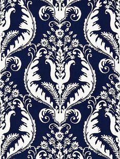 an ornate blue and white wallpaper pattern with the words, the house of luxury fabrics