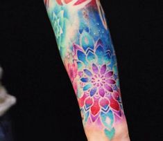 a person with a colorful tattoo on their arm