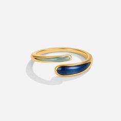 Safira Blue Wrap Ring Gold Plated Blue Rings As Gift, Blue Gold Plated Rings As Gift, Blue Gold-plated Rings For Gifts, Blue Gold Plated Rings For Gift, Blue Polished Open Ring Jewelry, Blue Open Ring Jewelry With Polished Finish, Blue Polished Finish Open Ring Jewelry, Blue Enamel Ring With Polished Finish As Gift, Blue Enamel Ring With Polished Finish For Gift