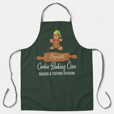 a green apron with an image of a ginger holding a baking spoon and the words cookie baking club on it