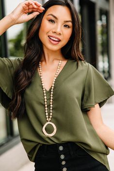 Chic Olive Green Top - Cute Women's Boutique Tops – Shop The Mint Olive Green Top, Cute Tops For Women, Floral Cocktail Dress, Black Tie Dress, Long Sleeve Outerwear, Mint Julep Boutique, Two Piece Swimwear, Shorts Pants, Boutique Tops