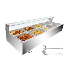 a stainless steel buffet table with six compartments and utensils