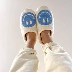 The Original Happy Face Slippers: BUY 1 GET 1 FREE ♡ + Free Socks & Free Tracked Shipping 😍 Introducing the Original Happy Face Slippers! These cozy slippers are perfect for both men and women and will keep your feet warm and comfortable. Made of soft, fluffy material, they have a nonslip sole that makes them ideal for wearing anywhere. Whether you're relaxing at home or running errands, these slippers will keep your feet happy. Limited Time: Get Free Happy Socks! Get in on the hot trend while you can and show off your happy personality with happy face slippers and happy face socks for FREE! ANTI SLIP: Don’t worry be happy! With thick comfy durable Anti Slip soles, an embroidered happy face, and soft, plush fabric, these cozy slippers will have you comfortable wear after wear. Our happy s Happy Face Slippers, Smiley Face Slippers, Yellow Socks, Cozy Slippers, Matching Socks, Reindeer Headband, Fur Wrap, Light Weight Shoes, Slippers Cozy