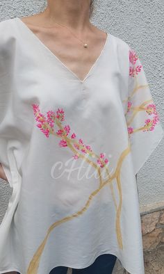 Limited, unique, hand painted silk-viscose tunic with pink Bougainvillea. You will be special wearing this clothes. The item made of silk-viscose fabric, it is pleasant to wear in the summer heat. Hand painted and sewing by me.  Dry-cleanable or handwash only and please don't tumble dry! Handmade item. There is a seam on both side. You can see in the last picture all windths and lengths. The whole length is 70 cm. If you have any questions, please contact me. https://www.instagram.com/p/C8oW6O3o Spring Silk Kaftan With Floral Embroidery, Silk Kaftan With Floral Embroidery For Spring, Spring Silk V-neck Kaftan, Casual Silk Kaftan For Spring, White Hand Painted Top For Summer, Silk Summer Tops With Floral Embroidery, Summer Silk Tunic With Floral Print, Silk V-neck Tunic For Summer, Silk V-neck Spring Kaftan