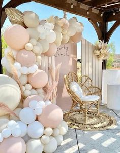 an outdoor area with balloons and chairs