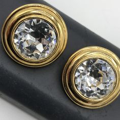 ON SALE Collectible Monet designer signed headlight rhinestone couture earrings in excellent vintage condition. Measures 1 inch round. Very classy addition to any wardrobe or collection. Formal Clip-on Round Crystal Earrings, Formal Jeweled Round Earrings, Classic Formal Rhinestone Earrings, Round Jeweled Earrings For Formal Occasions, Costume Jewelry Jeweled Clip-on Earrings For Formal Occasions, Costume Jewelry Style Jeweled Clip-on Earrings For Formal Events, Formal Jeweled Clip-on Costume Jewelry Earrings, Costume Jewelry Clip-on Earrings With Jewels For Formal Events, Formal Costume Jewelry Clip-on Earrings