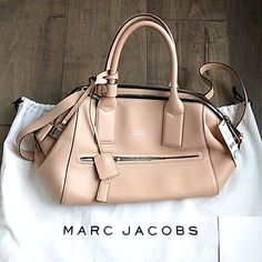 Beautiful Marc Jacobs Tanish Blush Leather Satchel/Crossbody Bag!!Made In Italy!!!Tags Still Attatched Retails For 1820.00.Has A Few Small Marks From Storage.Two Near The Zipper,Small Pen Mark,Bottom Left And A Tiny Mark Inside (All Pictured!!)Great Size And Nuetral Color That Goes With Everything!!!Comes With Dustbag!!!Pen Mark On Dustbag(Pictured).All From Storage!!8lx17w. Satchel Strap Drop 6 Inches And Crossbody Strap 21 Inches. Designer Beige Satchel With Zipper Closure, Classic Blush Leather Shoulder Bag, Designer Blush Bag With Detachable Strap, Designer Blush Bag With Detachable Handle, Blush Leather Top Handle Satchel, Designer Blush Bag For Everyday Use, Blush Leather Bag With Gold-tone Hardware, Luxury Blush Leather Shoulder Bag, Blush Travel Bag With Dust Bag Included