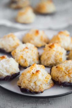 some food is on a white plate and it looks like coconut macaroni and cheese