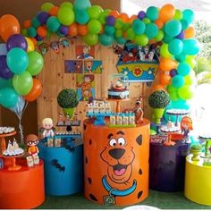 a birthday party with balloons and decorations