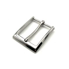 a metal buckle on a white background