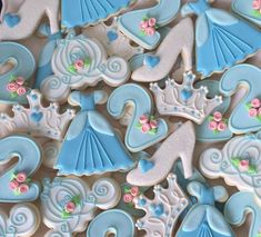 some blue and white decorated cookies on a table