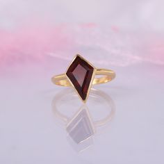 Vintage Antique Garnet Ring, 14k Solid Gold, Art Deco Kite Shaped Garnet Purpose Ring, Wedding Ring, January Birthstone, Anniversary Gift Main Stone: Garnet Main Stone creation- Lab Created Main Stone Size: 7x12mm Main Stone Color: Red Main Stone Shape: Kite Birthstone Month: January Jewelry Type: Wedding ring Metal: 14k Rose Gold \925 Sterling Silver Method: Cast Personalization: Possible Occasion: Engagement Style: Ring Size: We make rings from US 4 to US 10. (If you need smaller or bigger rin Garnet Open Ring Jewelry For Wedding, Yellow Gold Garnet Wedding Jewelry, Garnet Bezel Set Rings For Wedding, Open Ring With Faceted Design For Wedding, Gold Amethyst Ring With Polished Finish For Wedding, Garnet Jewelry With Bezel Setting For Wedding, Gold Amethyst Ring For Wedding With Polished Finish, Ruby Open Ring With Bezel Setting For Wedding, Formal Gold Diamond Ring With Garnet