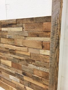 a wooden headboard made out of old pallet wood planks is shown in this image