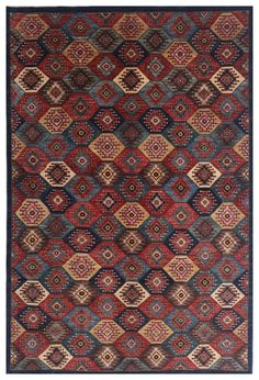 an old rug with many different colors and patterns