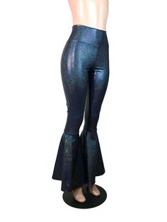 "**Due to SO MANY issues with USPS - we STRONGLY ENCOURAGE you to purchase the UPS Upgrade with your order located here: https://www.etsy.com/listing/926751536/ups-upgrade Made of stretchy black hologram shimmery spandex - these high-waisted bell bottoms will fit you perfectly. They hug your hips and flare out at the feet. This color is stunning! The inseam is 35\" (the mannequin is 5'8\") but can be customized by putting your desired inseam in the comments/notes when checking out. Womens Sizing Disco Style Stretch Wide Leg Bottoms, Stretch Disco Pants For Fall, Disco Style Stretch Pants For Fall, Fall Disco Stretch Pants, High Waist Disco Bottoms For Fall, Vintage High Waist Party Bottoms, Vintage High Waist Pants For Party, Fall Season Stretch Disco Pants, Vintage Flare Pants For Party