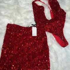 Never Worn Red Glitter Mini Skirt, Glamorous Red Bottoms For Party Season, Chic Red Bottoms For Party, Red Sequined Bottoms For Night Out, Red Mini Skirt For Evening, Glamorous Red Bottoms For Summer, Red Fitted Bottoms For Holiday, Red Evening Skirt For Party Season, Red Stretch Bottoms For Party Season