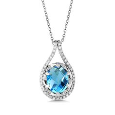 Birmingham Jewelry Item Number: BJP118W-DBT Type: Pendant Style: Fashion Jewelry 14K White Gold Pendant Blue topaz and diamond pendant in 14k white gold with oval 10.00mm X 8.00 mm center. Total Diamond Weight: 0.15ct approx. *The possibilities are not limited to the options in the dropdown. For pricing on further customizations & special options, please call: 1-586-939-5100 Formal Blue Oval Diamond Necklace, Luxury Blue Diamond Necklace, Blue Oval Diamond Necklace Fine Jewelry, Blue Oval Diamond Necklace In Fine Jewelry Style, Oval Blue Diamond Necklaces, Blue Oval Diamond Necklaces, Luxury Blue Diamond Necklace For Anniversary, Blue Luxury Diamond Necklace For Anniversary, Formal Blue Diamond Gemstone Necklace