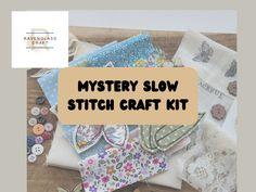 the mystery slow stitch craft kit includes many different fabrics, buttons and other sewing supplies