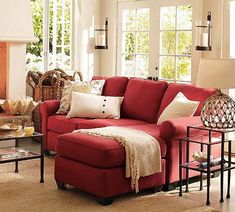 a living room filled with furniture and a fire place