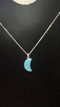 Light blue crackle crescent moon necklace. Blue Crescent Necklace For Gift, Blue Mystical Necklace With Moon Charm, Blue Moon Necklace, Blue Crescent Moon Charm Jewelry, Handmade Blue Moon-shaped Necklaces, Silver Lights, Crescent Moon Necklace, Moon Necklace, Crescent Moon