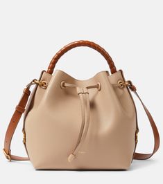 Marcie Small leather tote bag in beige - Chloe | Mytheresa Chloe Small Marcie Bag, Luxury Leather Bucket Bag With Handles, Beige Leather Bucket Bag With Handle Drop, Beige Leather Hobo Bag With Handle Drop, Leather Beige Bucket Bag With Handle Drop, Beige Leather-lined Bucket Shoulder Bag, Beige Bucket Shoulder Bag With Leather Lining, Brown Calf Leather Satchel With Dust Bag, Beige Calf Leather Shoulder Bag For Travel