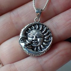 This is a very beautiful sterling silver celestial charm with a detailed sun and moon. It measures 1.1” long including the bail and .8" wide. This charm is photographed on a 1 mm sterling silver rounded box chain which is sold separately. It can be found here. Celestial Sun And Moon Sterling Silver Necklace, Silver Celestial Pendant Jewelry, Silver Necklace With Sun And Moon Round Pendant, Sterling Silver Sun And Moon Spiritual Necklace, Sterling Silver Spiritual Necklace With Sun And Moon Design, Spiritual Sterling Silver Necklace With Sun And Moon Design, Spiritual Sterling Silver Sun And Moon Necklace, Sterling Silver Sun And Moon Round Necklace, Sterling Silver Moon Charm Jewelry